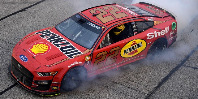 Logano's car featured a throwback scheme that looked like the first car he raced as a child.