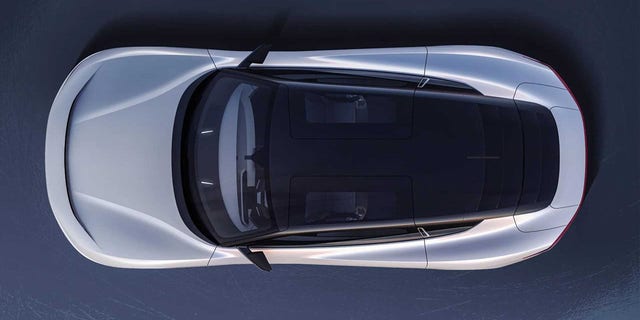 The Alpha5's gullwing doors have glass roof panels.