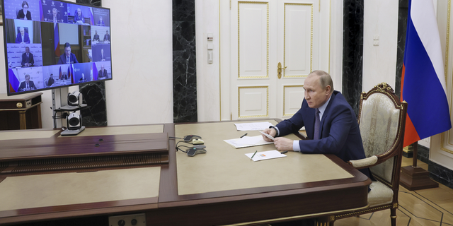 Russian President Vladimir Putin chairs a meeting on oil industry development via a video conference at the Kremlin in Moscow, Russia, on Tuesday, May 17.
