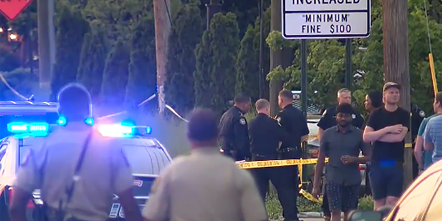 Law enforcement outside the scene of a shooting at the Fogo de Chao restaurant in Atlanta.