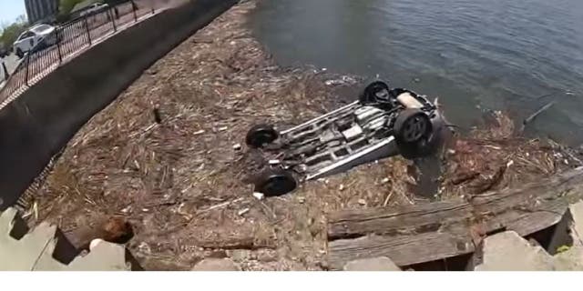 New Jersey authorities rescue woman from submerged SUV