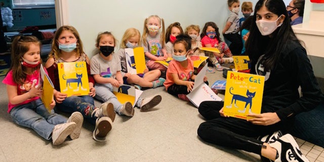 West Virginia high schooler Rania Zuri donates books to children in Head Start programs across the state.