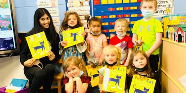West Virginia high schooler Rania Zuri donates books to children in Head Start programs across the state.