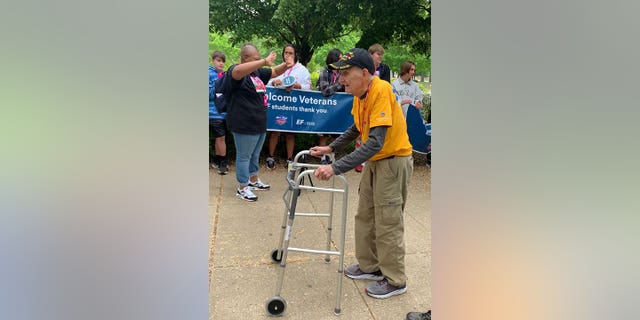 A veteran walking during the Honor Flight Network celebration.