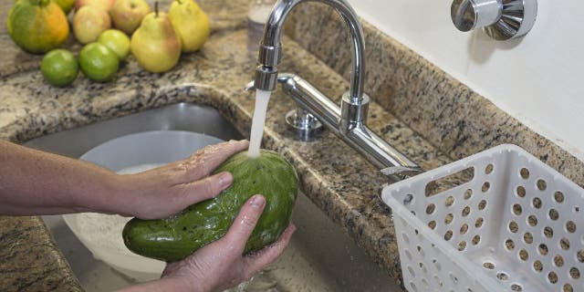Fruits and vegetables should be rinsed well before eating, according to the FDA.
