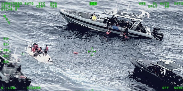 Rescue craft arrive on scene after a migrant vessel capsized north of Desecheo Island, Puerto Rico May 12, 2022 in a still image from surveillance aircraft video. (United States Coast Guard/Handout via REUTERS.)