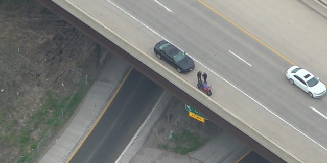 Iowa State Trooper Pilot Taylor Grimm directs another trooper through radio to pull over a speeding motorcyclist. The motorcyclist didn't have a license to ride at the time of the stop.