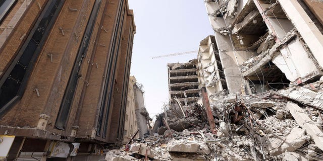 In this photo released by the official website of the Iranian Vice President's Office, Friday, May 27, 2022, the ruins of a tower of the 10-storey Metropol building under construction remain after it collapsed on Monday, in the city of Abadan, in the the southwest of the country.  , Iran.