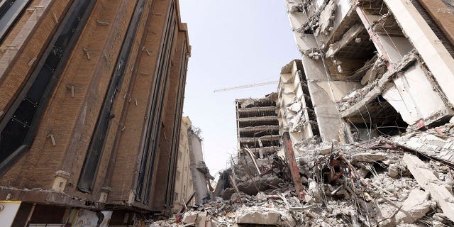 In this photo released by official website of the office of Iranian Senior Vice-President, on Friday, May 27, 2022, ruins of a tower at under construction 10-story Metropol Building remains after it collapsed on Monday, in the southwestern city of Abadan, Iran.