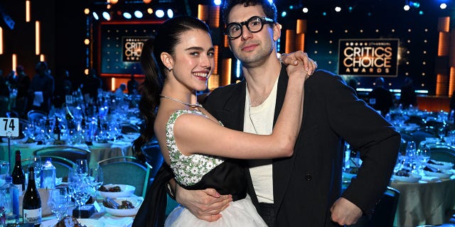 LOS ANGELES, CALIFORNIA - MARCH 13: Margaret Qualley and Jack Antonoff with Champagne Collet & OBC wines as they celebrate the 27th Annual Critics Choice Awards at Fairmont Century Plaza on March 13, 2022 in Los Angeles, California.