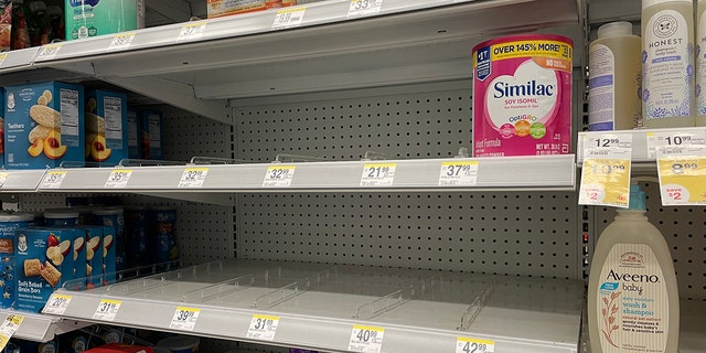 These shelves shown at a store in New York had very little baby formula for sale this week.