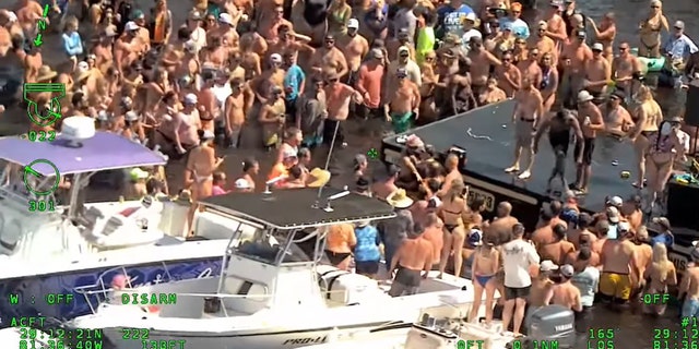 A fight broke out at the unsanctioned "Mayhem at Lake George" event, authorities said.