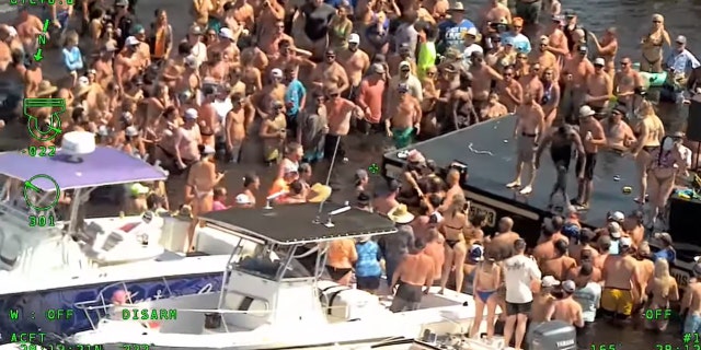 A fight broke out at the unsanctioned "Mayhem at Lake George" event, authorities said.