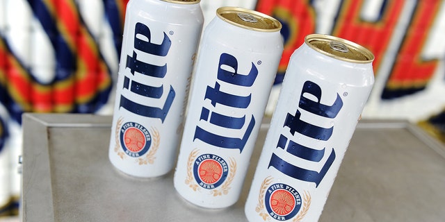 Cans of Miller Lite are shown on display at the Miller Lite Beer Hall, created by MAC Presents, at the Governors Ball on June 3, 2016, in New York City. 