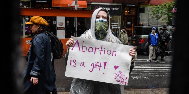 Abortion-rights activists gather outside of a Catholic church in downtown Manhattan to voice their support for a woman's right to choose on May 07, 2022 in New York City. 