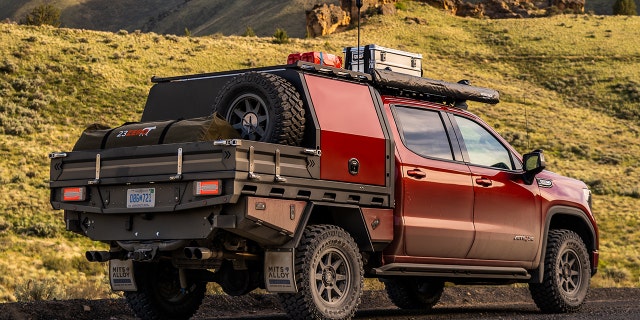 The truck bed has been replaced with a landing tray.