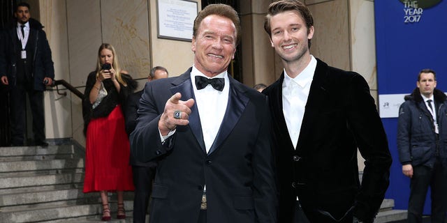 Arnold Schwarzenegger and his son Patrick Schwarzenegger are seen in 2017.