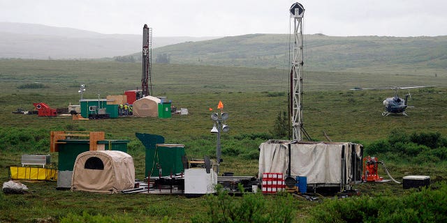 Workers with the Pebble Mine project test drill in the Bristol Bay region of Alaska, near the village of Iliamma, July 13, 2007.