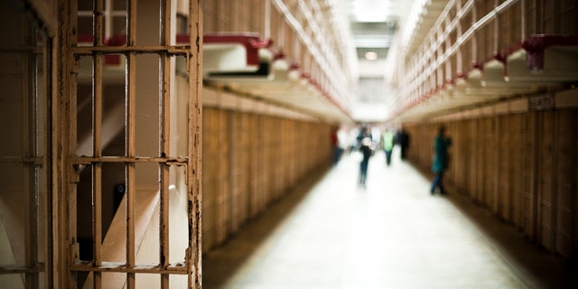 FILE - A prison hallway.