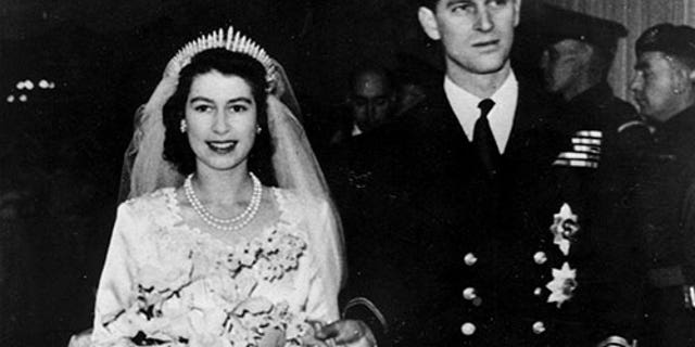 Britain's Princess Elizabeth leaves Westminster Abbey in London with her husband, the Duke of Edinburgh, after their wedding on Nov. 20, 1947.