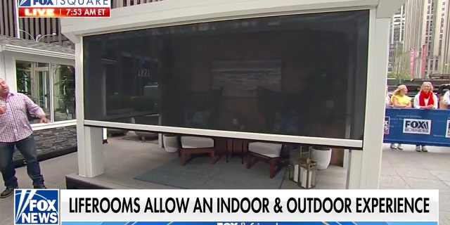 This liferoom has remote controlled screens to help beat the heat and keep bugs out. 