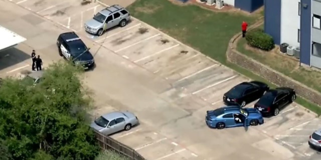 A repo man in his 50s was shot while trying to repossess a car at an apartment complex in Arlington on Monday afternoon.