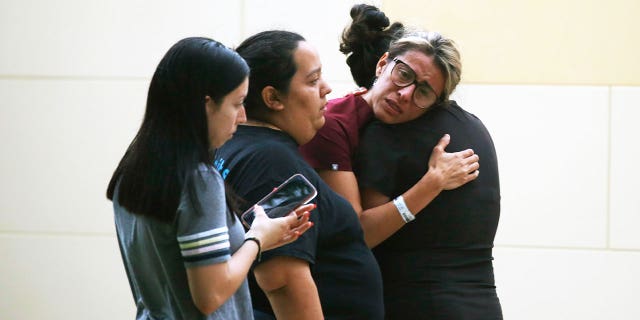 People react following a deadly school shooting in Uvalde, Texas (AP/Dario Lopez-Mills)