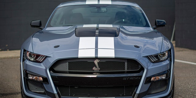 The stock GT500 doesn't have the auxiliary hood vents seen on the Hertz car.