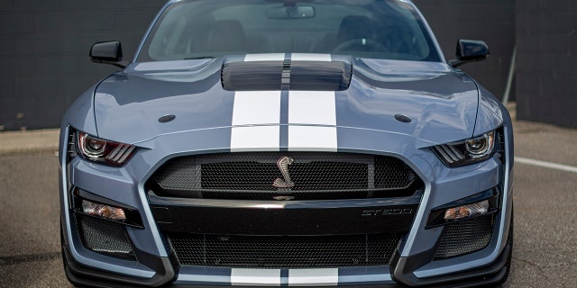 The stock GT500 doesn't have the auxiliary hood vents seen on the Hertz car.