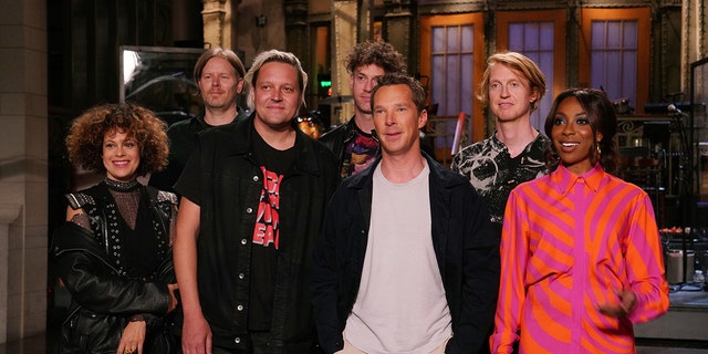 SATURDAY NIGHT LIVE - Benedict Cumberbatch, Arcade Fire Episode 1824 - Pictured: (lr) Arcade Fire music guest, host Benedict Cumberbatch, and Ego Nwodim during promotions at Studio 8H on Thursday, May 5, 2022.
