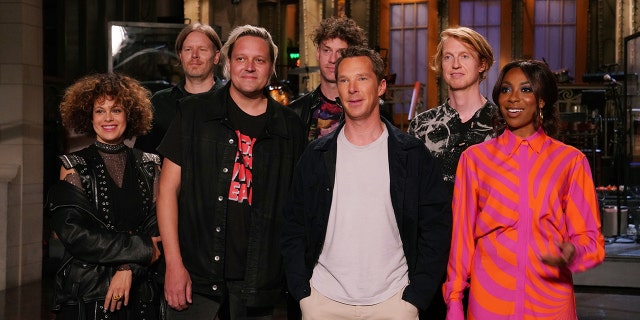 SATURDAY NIGHT LIVE -- Benedict Cumberbatch, Arcade Fire Episode 1824 -- Pictured: (l-r) Musical guest Arcade Fire, host Benedict Cumberbatch, and Ego Nwodim during promos in Studio 8H on Thursday, May 5, 2022.