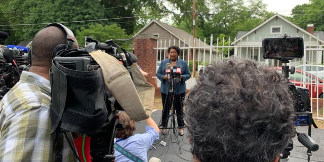 Stacey Abrams addresses a crowd ahead during Georgia's primary election.