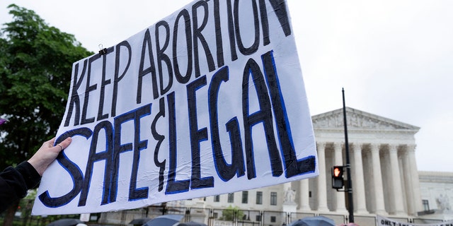 Pro-abortion protesters rally for abortion rights outside the United States Supreme Court in Washington, DC on May 7, 2022. (Photo by Jose Luis Magana / AFP) (Photo by JOSE LUIS MAGANA/AFP / AFP via Getty Images)