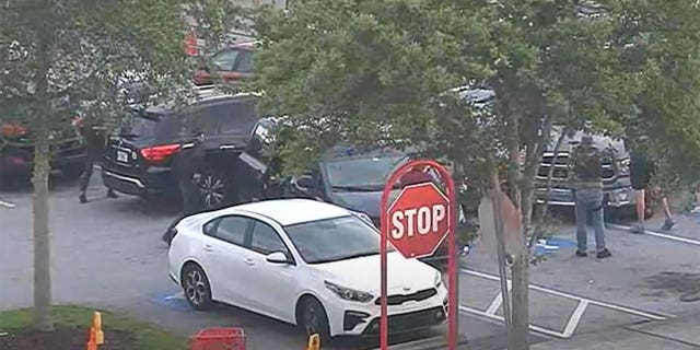 This screengrab from surveillance video released by the Osceola County Sheriff's Office showed unmarked vehicles box in an Audi driven by 20-year-old Jayden Baez.