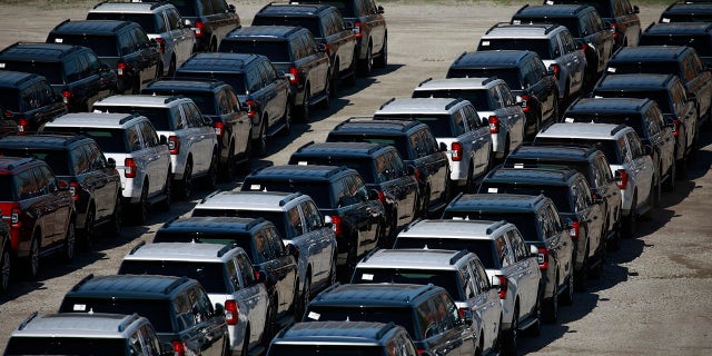 Ford Motor vehicles parked in an overflow lot in Louisville, Kentucky, U.S., on Tuesday, April 19, 2022. A shortage in automotive semiconductor chips has caused vehicle manufacturers to scale back production of automobiles.