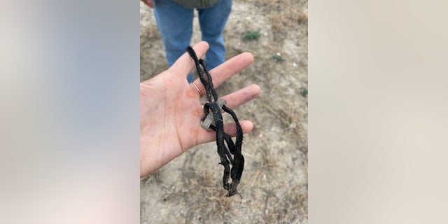 A pair of rope handcuffs was left behind by law enforcement on Double M Ranch. The handcuffs are used to place migrants in custody when border patrol apprehends them on U.S. property. 