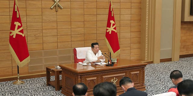 In this photo provided by the North Korean government, North Korean leader Kim Jong Un attends a ruling party's politburo meeting in Pyongyang, North Korea, Sunday, May 29, 2022. 