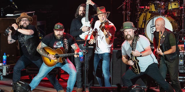 Hopkins, second from right, has been with the band since its start in 2002. 