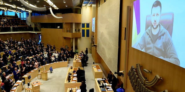 Critical NATO Decisions Regarding Finland and Sweden Expected This Week 4 FILE - Ukraine's President Volodymyr Zelenskyy receives a standing ovation as he addresses Sweden's parliament via video link, in Stockholm, March 24, 2022. The question of whether to join NATO is coming to a head in Finland and Sweden, where Russia's invasion of Ukraine has shattered the long-held belief that remaining outside the military alliance was the best way to avoid trouble with their giant neighbor. (Paul Wennerholm/TT News Agency via AP, File)