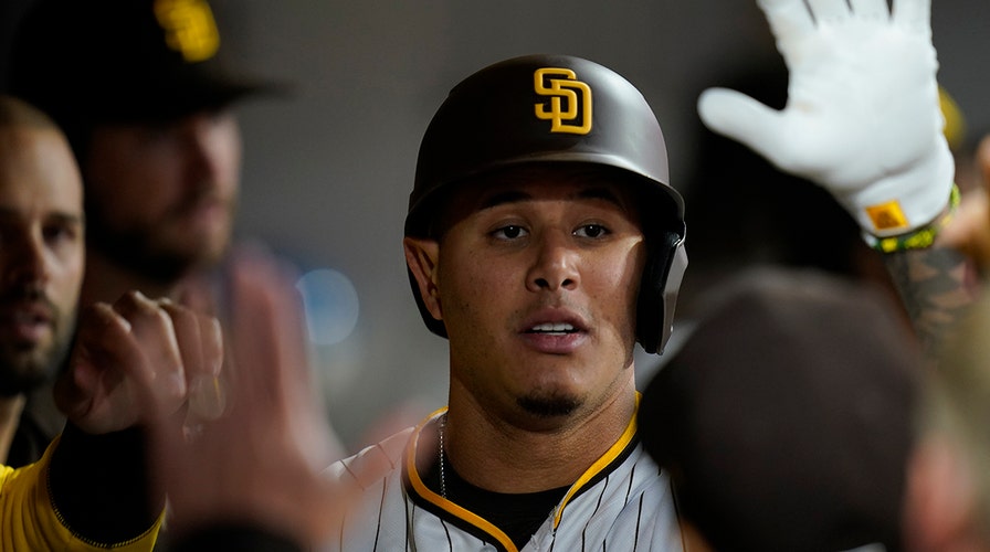 San Diego Padres shortstop Manny Machado, right, speaks to New