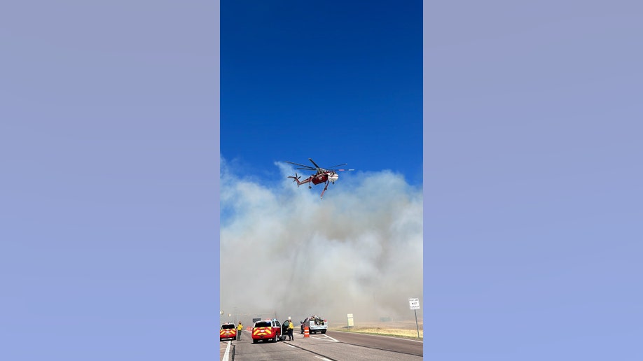 A helicopter on the scene of a Colorado grass fire