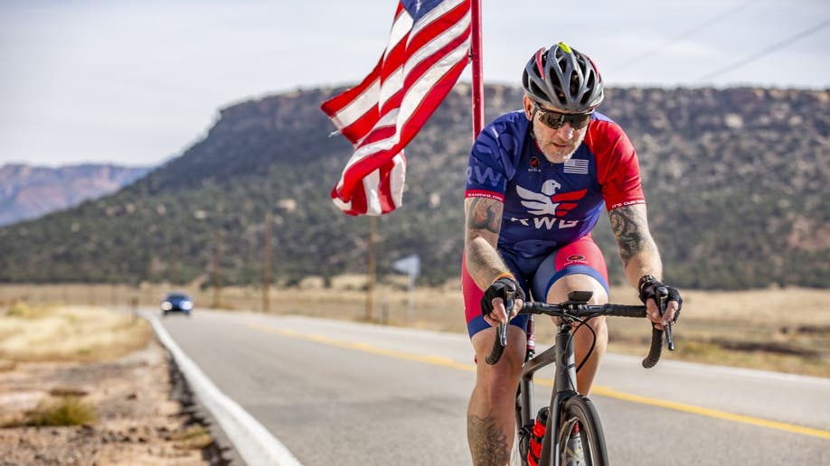 A man rides a bike during the Old Glory Relay.