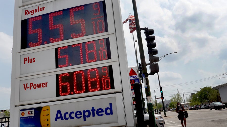 A sign displays gas prices at a gas station on May 10, 2022 in Chicago, Illinois. Nationwide, the average price for a gallon of regular gasoline reached a record high today of $4.37 a gallon.