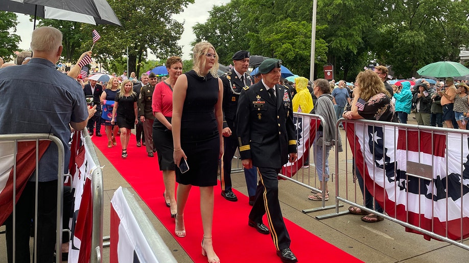 Ret. Army Lt. Gen. Keith Huber walks down the red carpet at grand ole opry