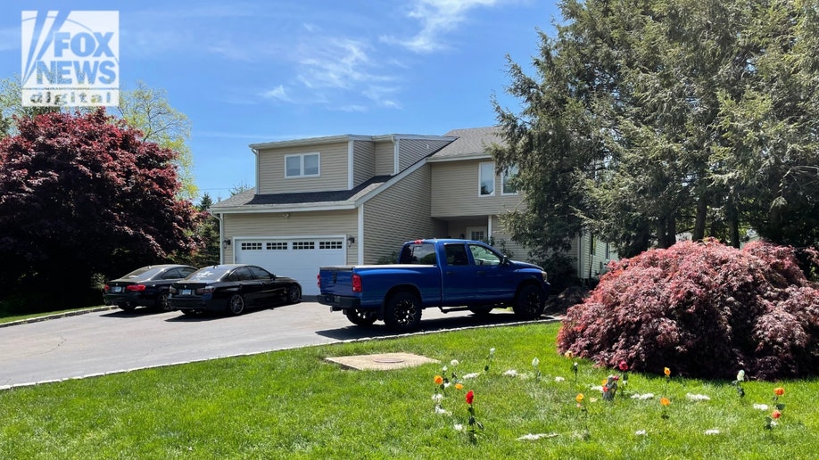 A 16-year-old murder suspect allegedly stabbed Jimmy McGrath outside this home on Laurel Glen Drive in Milford, Connecticut, where a memorial in the shape of a heart was placed outside.