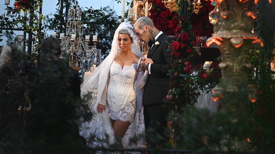 Kourtney Kardashian was a vision in white during the wedding ceremony to marry Travis Barker