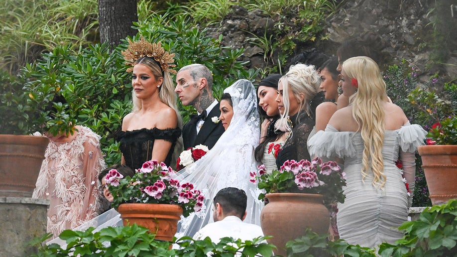 Khloe Kardashian poses with her family after Kourtney Kardashians wedding to Travis Barker