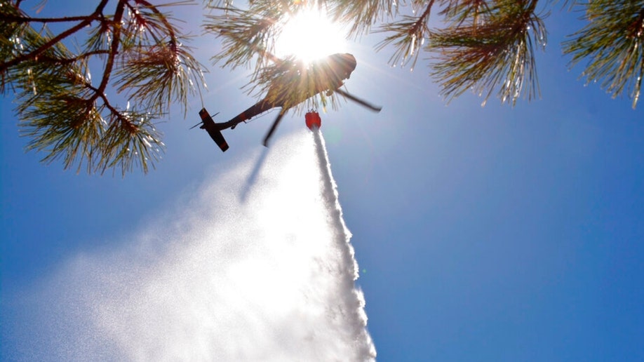 New Mexico National Guard Aviation soldiers execute water drops