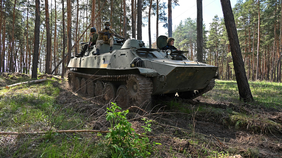 Ukrainian soldiers in armored vehicle