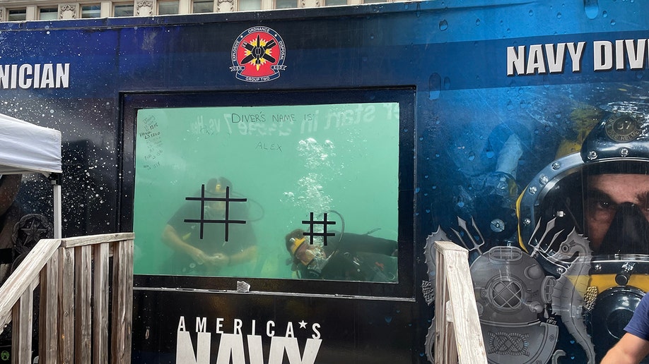 us navy dives in times square